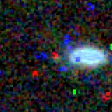 Colour composite: F444W red, F356W green, F277W blue, 3.2 arcsec across, north up