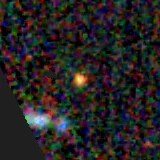 Colour composite: F444W red, F356W green, F277W blue, 3.2 arcsec across, north up