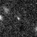 F115W image, 3.2 arcsec across, north up