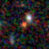 Colour composite: F444W red, F356W green, F277W blue, 3.2 arcsec across, north up