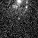 F115W image, 3.2 arcsec across, north up