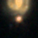 Colour composite: F444W red, F356W green, F277W blue, 3.2 arcsec across, north up