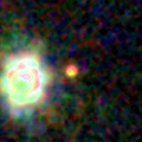 Colour composite: F444W red, F356W green, F277W blue, 3.2 arcsec across, north up