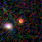 Colour composite: F444W red, F356W green, F277W blue, 3.2 arcsec across, north up