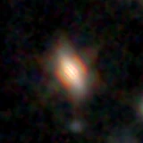 Colour composite: F444W red, F356W green, F277W blue, 3.2 arcsec across, north up