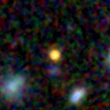 Colour composite: F444W red, F356W green, F277W blue, 3.2 arcsec across, north up