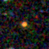 Colour composite: F444W red, F356W green, F277W blue, 3.2 arcsec across, north up