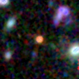 Colour composite: F444W red, F356W green, F277W blue, 3.2 arcsec across, north up