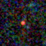 Colour composite: F444W red, F356W green, F277W blue, 3.2 arcsec across, north up