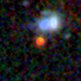 Colour composite: F444W red, F356W green, F277W blue, 3.2 arcsec across, north up