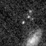 F115W image, 3.2 arcsec across, north up
