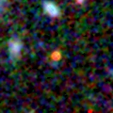 Colour composite: F444W red, F356W green, F277W blue, 3.2 arcsec across, north up