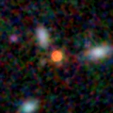 Colour composite: F444W red, F356W green, F277W blue, 3.2 arcsec across, north up