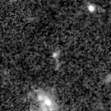 F115W image, 3.2 arcsec across, north up