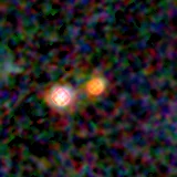 Colour composite: F444W red, F356W green, F277W blue, 3.2 arcsec across, north up
