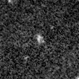 F115W image, 3.2 arcsec across, north up