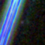 Colour composite: F444W red, F356W green, F277W blue, 3.2 arcsec across, north up