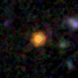 Colour composite: F444W red, F356W green, F277W blue, 3.2 arcsec across, north up