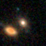 Colour composite: F444W red, F356W green, F277W blue, 3.2 arcsec across, north up