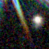 Colour composite: F444W red, F356W green, F277W blue, 3.2 arcsec across, north up