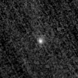 F115W image, 3.2 arcsec across, north up