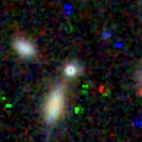 Colour composite: F444W red, F356W green, F277W blue, 3.2 arcsec across, north up