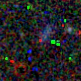 Colour composite: F444W red, F356W green, F277W blue, 3.2 arcsec across, north up