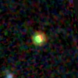 Colour composite: F444W red, F356W green, F277W blue, 3.2 arcsec across, north up