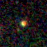 Colour composite: F444W red, F356W green, F277W blue, 3.2 arcsec across, north up