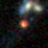 Colour composite: F444W red, F356W green, F277W blue, 3.2 arcsec across, north up