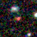 Colour composite: F444W red, F356W green, F277W blue, 3.2 arcsec across, north up
