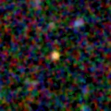 Colour composite: F444W red, F356W green, F277W blue, 3.2 arcsec across, north up