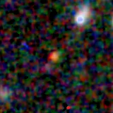 Colour composite: F444W red, F356W green, F277W blue, 3.2 arcsec across, north up
