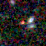 Colour composite: F444W red, F356W green, F277W blue, 3.2 arcsec across, north up