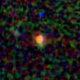 Colour composite: F444W red, F356W green, F277W blue, 3.2 arcsec across, north up