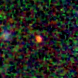 Colour composite: F444W red, F356W green, F277W blue, 3.2 arcsec across, north up
