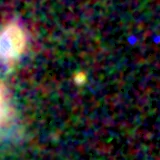 Colour composite: F444W red, F356W green, F277W blue, 3.2 arcsec across, north up