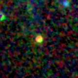 Colour composite: F444W red, F356W green, F277W blue, 3.2 arcsec across, north up