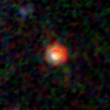Colour composite: F444W red, F356W green, F277W blue, 3.2 arcsec across, north up