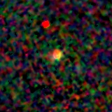 Colour composite: F444W red, F356W green, F277W blue, 3.2 arcsec across, north up