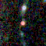 Colour composite: F444W red, F356W green, F277W blue, 3.2 arcsec across, north up