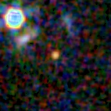 Colour composite: F444W red, F356W green, F277W blue, 3.2 arcsec across, north up