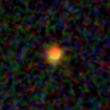 Colour composite: F444W red, F356W green, F277W blue, 3.2 arcsec across, north up