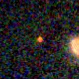 Colour composite: F444W red, F356W green, F277W blue, 3.2 arcsec across, north up