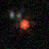 Colour composite: F444W red, F356W green, F277W blue, 3.2 arcsec across, north up