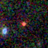 Colour composite: F444W red, F356W green, F277W blue, 3.2 arcsec across, north up