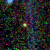 Colour composite: F444W red, F356W green, F277W blue, 3.2 arcsec across, north up