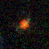 Colour composite: F444W red, F356W green, F277W blue, 3.2 arcsec across, north up