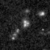 F090W image, 3.2 arcsec across, north up