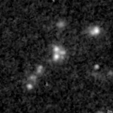 F115W image, 3.2 arcsec across, north up